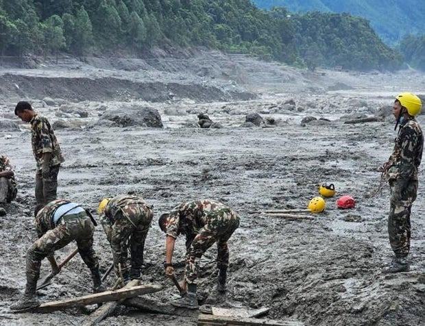 Families of those missing after Nepal floods struggle to cling to hope